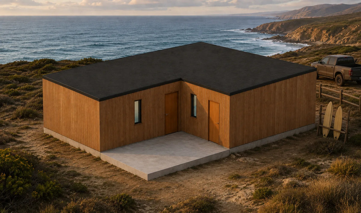 Vista de la esquina del Modelo La Boca 74 m² con las tablas de surf y la camioneta